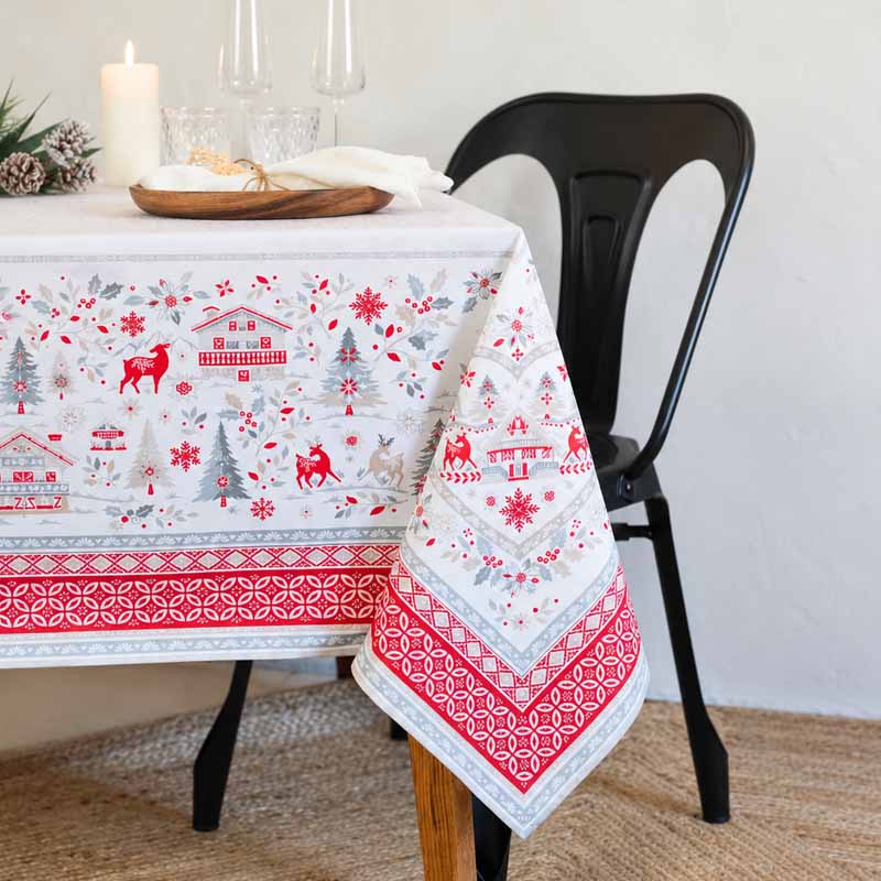 Festive Christmas stain-resistant tablecloth from France with a red and silver border pattern.