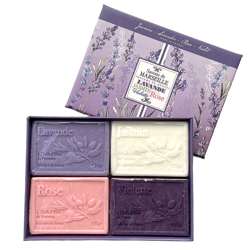 Set of four soaps in a decorative box with floral design
