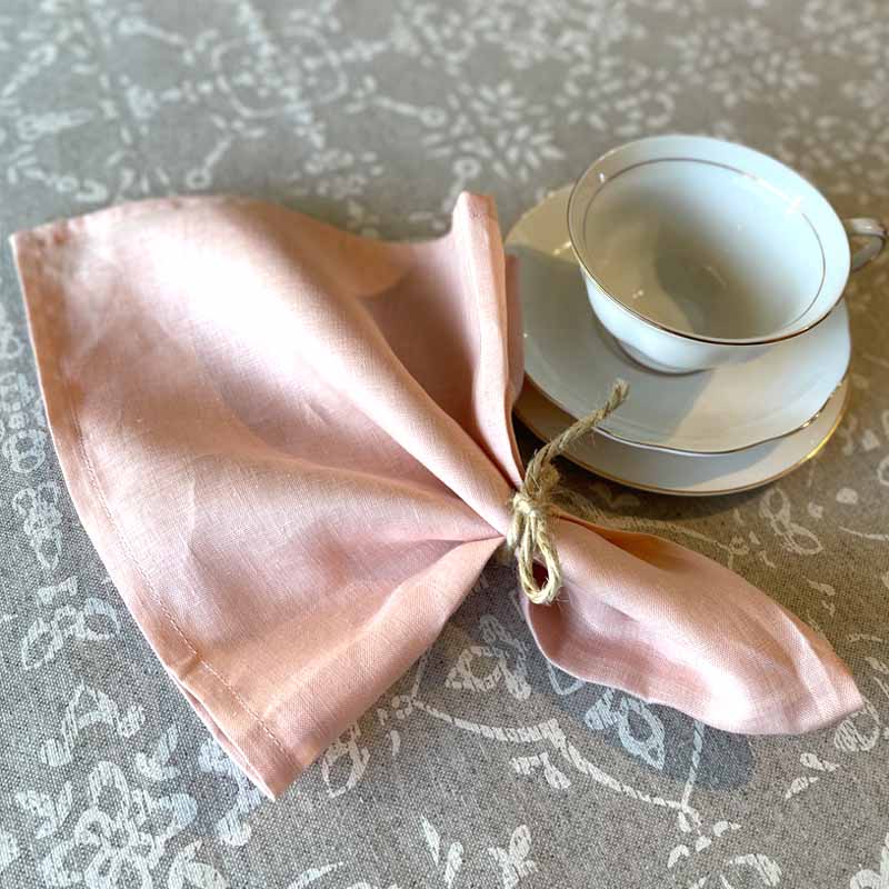 Light pink linen serviette hemmed