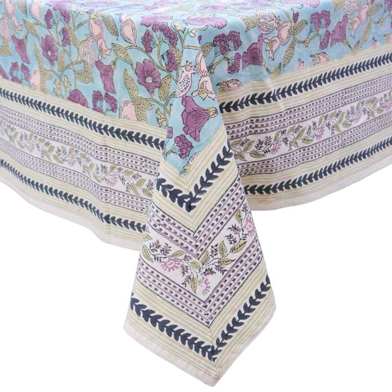Floral patterned tablecloth with decorative border on a white background