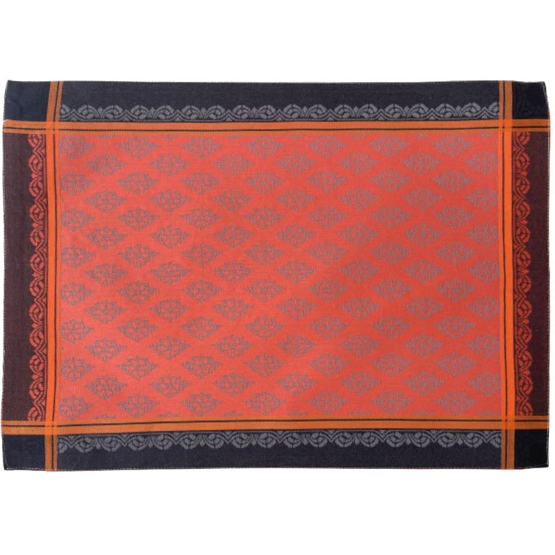 Placemat with an orange and black pattern on a white background