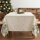 Christmas tablecloth with fir trees and deer design on the side borders.