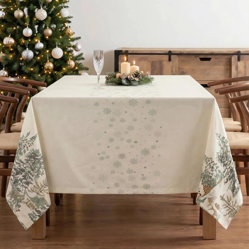 Christmas tablecloth with fir trees and deer design on the side borders.