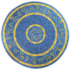 Round blue tablecloth with floral patterns and yellow accents on a white background