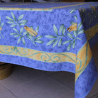 Blue tablecloth with floral patterns on a tiled floor background