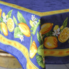 Tablecloth with lemon and orange design on a blue background