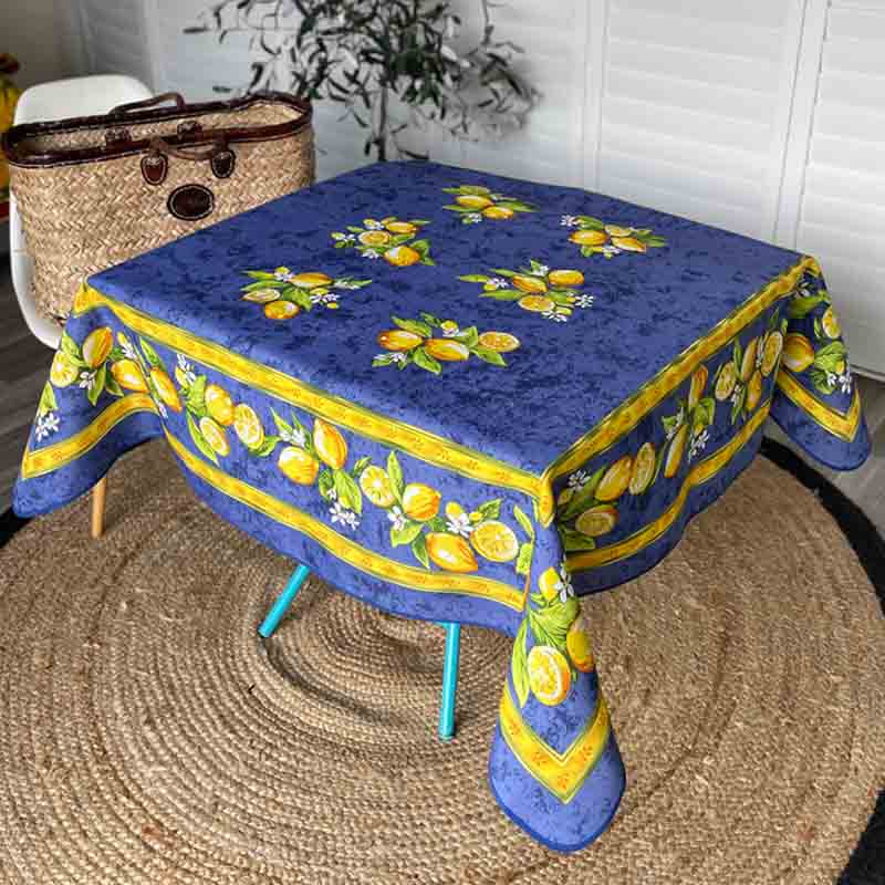 Square citron tablecloth in a living room setting