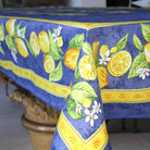 Tablecloth with lemon and orange design on a blue background