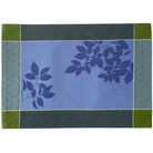 Rectangular placemat with blue and green leaf pattern on a white background