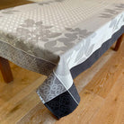 Tablecloth with floral pattern on a wooden floor