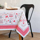 Festive Christmas stain-resistant tablecloth from France with a red and silver border pattern.