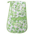 Double oven mitt with green leaf pattern on a white background