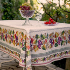 Decorative tablecloth with fruit pattern on a table outdoors