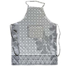 Floral patterned grey apron on a white background