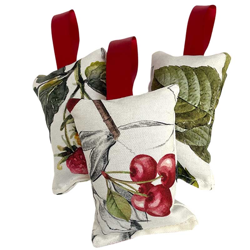 Hanging lavender sachets with cherry pattern and red hanging ribbon.
