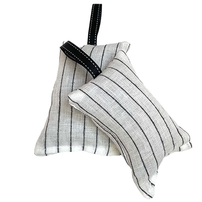 Two small square fabric hanging pouches with black pinstripes on a white background, one larger and one smaller, both with black hanging straps. Filled with lavender.
