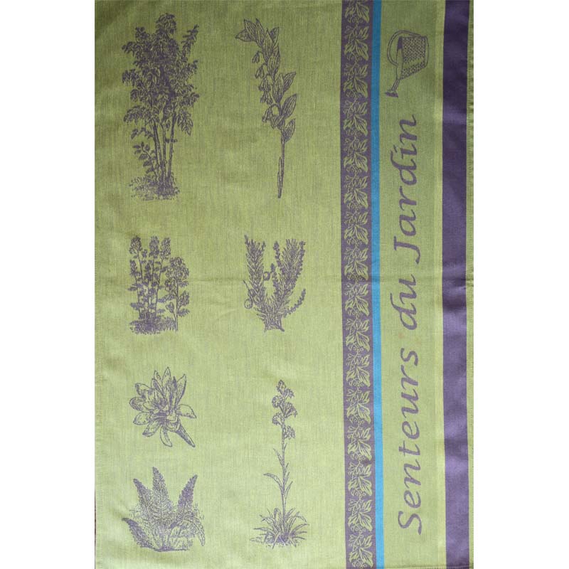 Green fabric with purple floral patterns and 'Senteurs du Jardin' text on a white background
