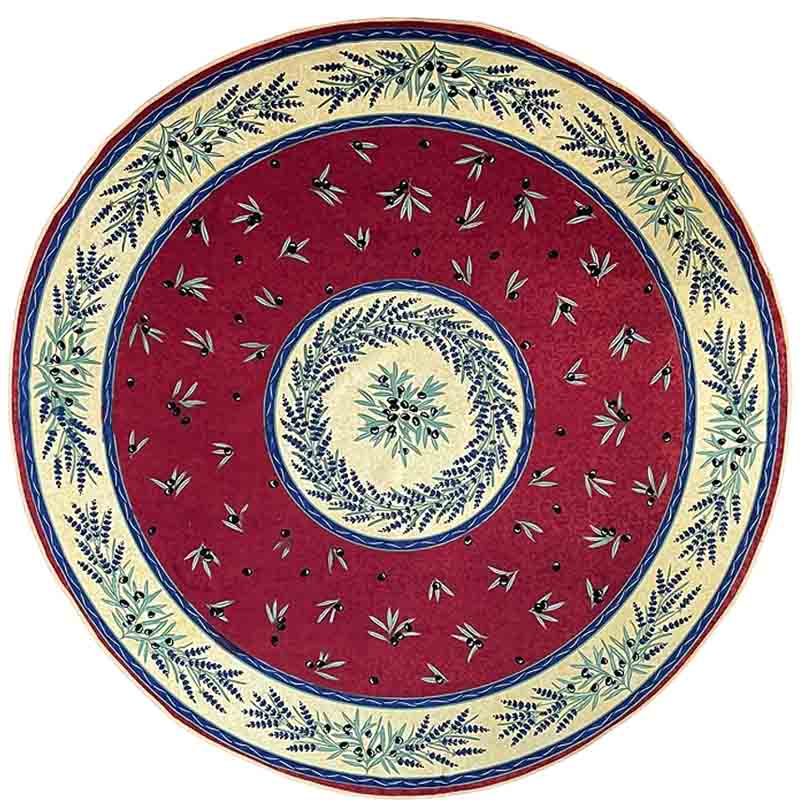 Decorative plate with red center and floral patterns on a white background