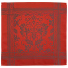 Orange jacquard napkins with intricate grey pattern