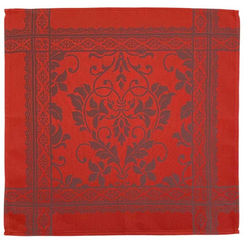 Orange jacquard napkins with intricate grey pattern