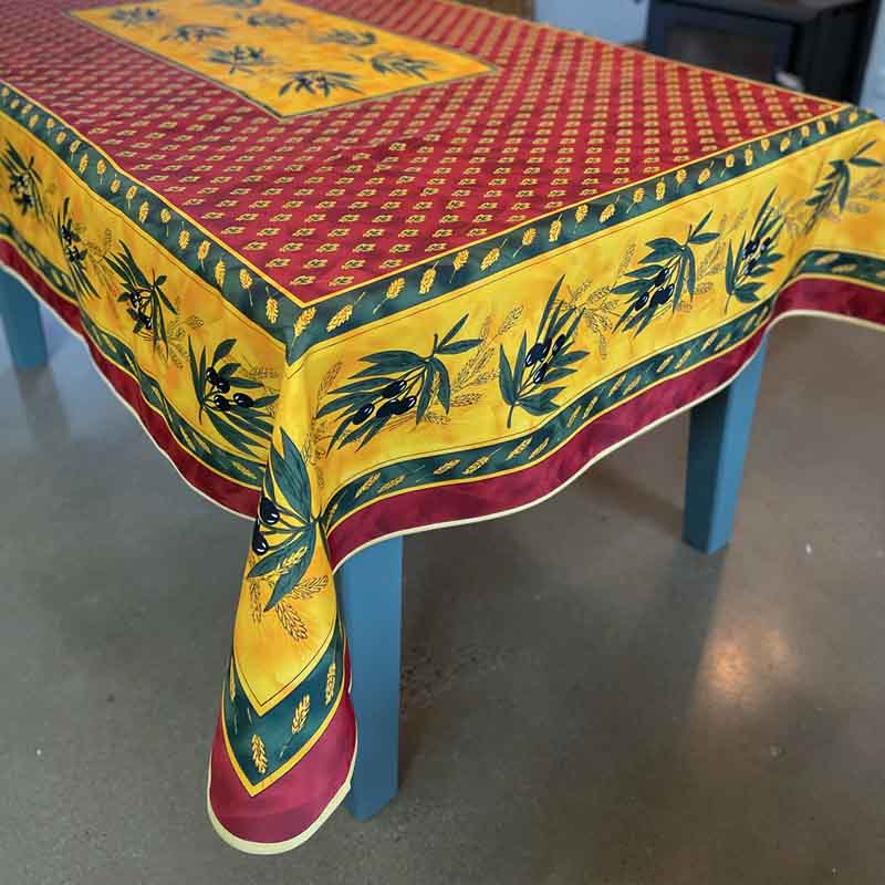 Colorful tablecloth with a pattern on a blue table