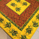 Decorative tablecloth with yellow and red pattern