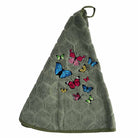 An olive green hand towel with a textured honeycomb pattern and colorful embroidered butterflies, shown on a plain white background.