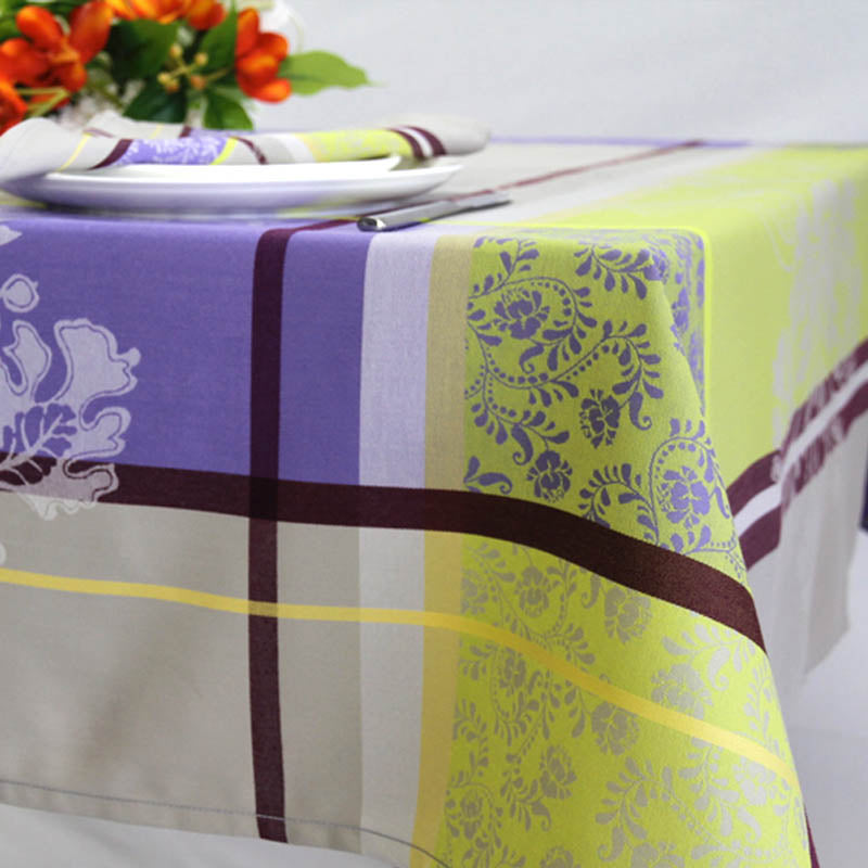 Corner of St Tropez jacquard tablecloth on table