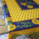Colorful tablecloth with sunflower design on a table