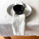 White with black stripe linen serviette